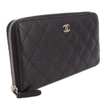 CHANEL quilted black zip-around wallet with CC logo and silver-tone zipper edge