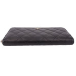 CHANEL quilted black zip-around wallet with smooth top edge and no visible contents