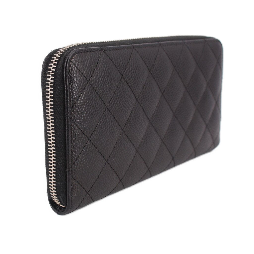 CHANEL quilted black zip-around wallet with CC logo and gold-tone zipper stitching
