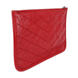 Red quilted Niki pouch wallet with diagonal stitch pattern and top zip