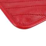 Red leather Niki pouch wallet edge with stitched panel and curved corner