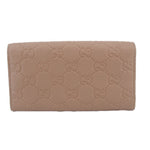 GUCCI taupe Continental wallet front view with repeating embossed GG pattern