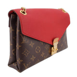 Red flap crossbody bag with monogram canvas body and gold-tone turn-lock closure