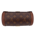 Monogram cylindrical trunk bag with top zipper and brown leather trim