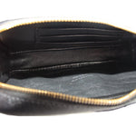 Saint Laurent mini Lou camera crossbody bag interior with black lining and gold zipper edge