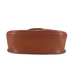 Cognac leather crossbody bag with smooth flat base and wide strap loops
