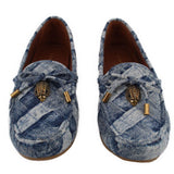 Pair of blue denim loafers with front ornament and gold-tone hardware