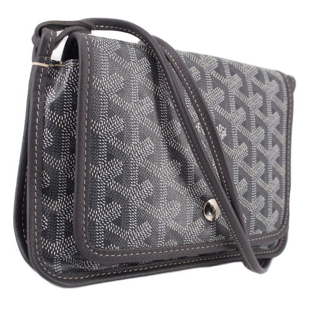 Gray patterned crossbody wallet with flap, front snap, and adjustable shoulder strap