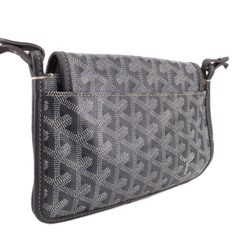 Gray patterned crossbody wallet with long strap and structured flap closure