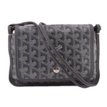 Gray patterned crossbody wallet with flap, leather trim, and adjustable shoulder strap