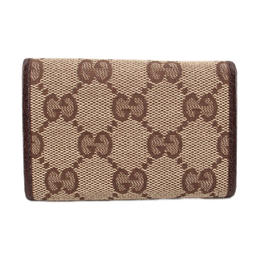 Brown Gucci tri-fold key case, front panel in GG monogram canvas