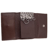 Brown Gucci tri-fold key case interior with key hooks and snap button