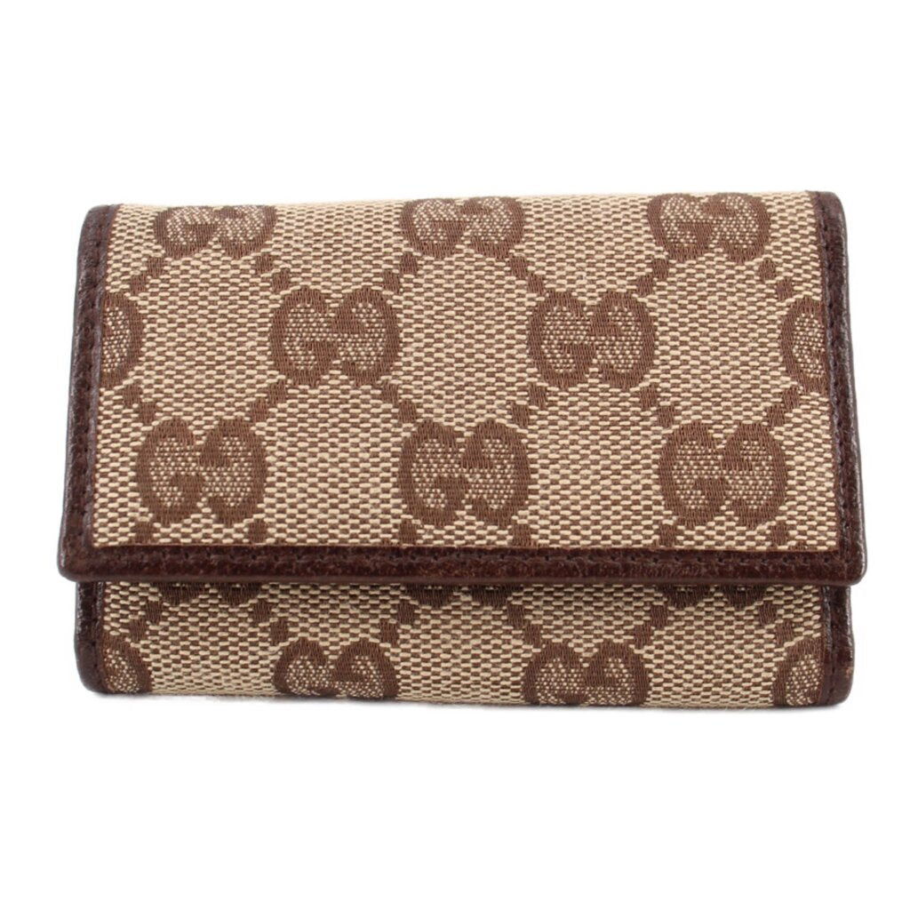 Brown Gucci tri-fold key case with GG monogram canvas and flap closure