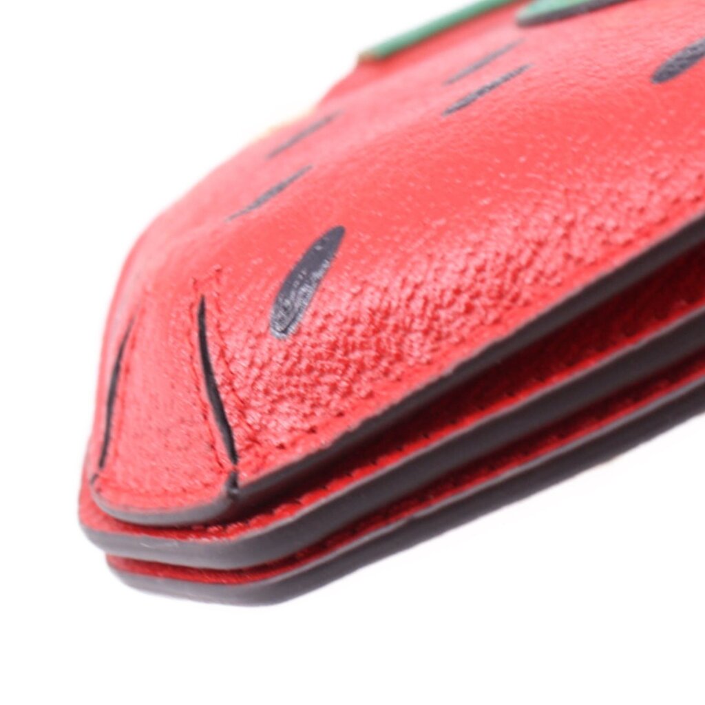 GUCCI strawberry crossbody bag edge detail, red leather with dark lining and green trim