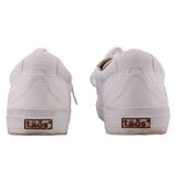 White leather sneakers with rear view and 'taos' logo heel tab