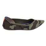Camo slip-on flats, side view, green-brown pattern with blue lining and orange accent