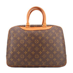 Louis Vuitton Deauville monogram travel bag top front view with tan leather trim