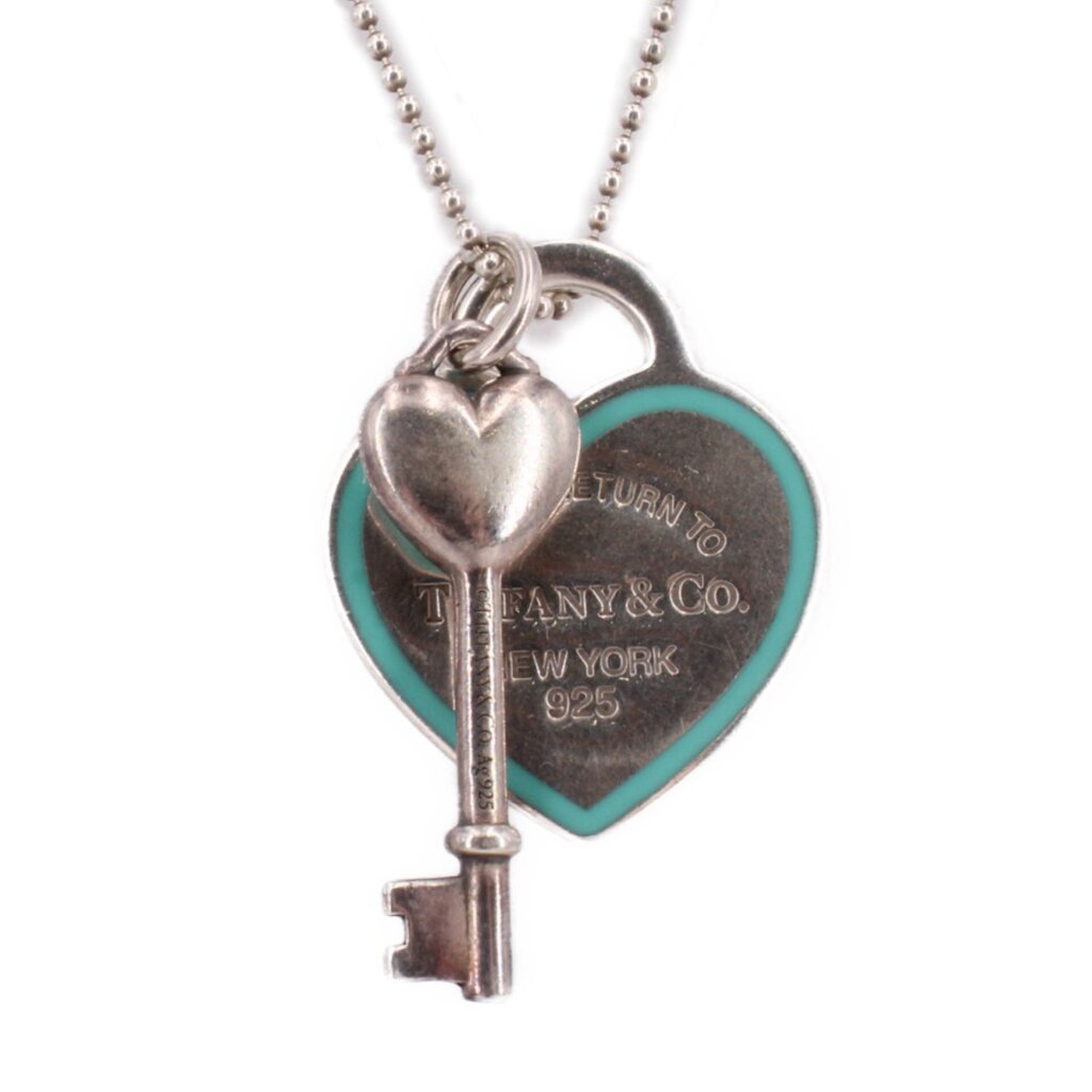 Tiffany & Co. key and heart pendant necklace with blue enamel heart and 925 stamp