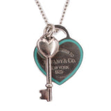 Tiffany & Co. key and heart pendant necklace with blue enamel heart and 925 stamp