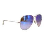 Aviator metal sunglasses with silver frame, blue gradient lenses, and slim temples