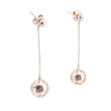 Ball drop earrings with small flower-like studs and long chain, round silver-tone dangles