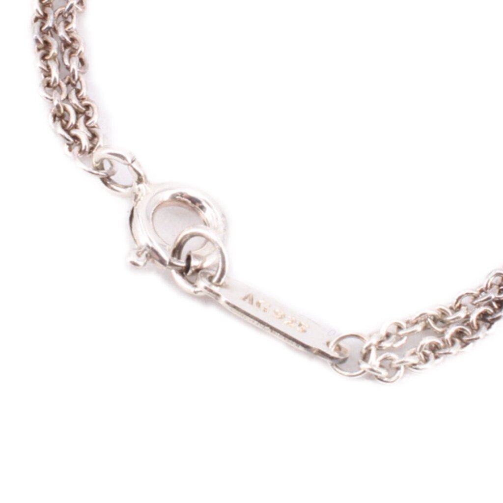 Silver-tone bracelet with clasp and short extender chain at the end