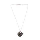 Silver heart pendant necklace with dark heart charm on a thin chain