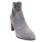 Metallic silver ankle bootie with textured sparkle and chunky block heel