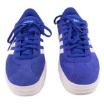 Pair of blue lace-up suede sneakers with white side panels and laces