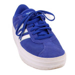 Blue lace-up suede sneakers with white sole and Adidas logo on tongue