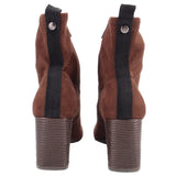 Brown faux suede ankle boots with dark elastic panel and textured block heel