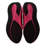 Black rubber outsole tread for pink running sneakers with forefoot traction.