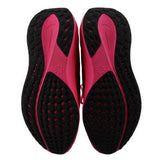 Black rubber outsole tread for pink running sneakers with forefoot traction.