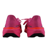 Pink heel view running sneakers with cushioned sole and black outsole tread.
