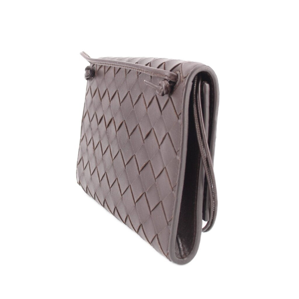 Chocolate woven leather crossbody pouch edge view with strap attachment loops