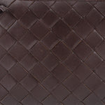Chocolate woven leather crossbody pouch, close-up of braided diamond pattern