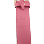 Pink leather belt strap with embossed Gucci code markings on the underside