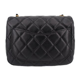 Black quilted mini crossbody bag back view with flap and stitched diamond pattern
