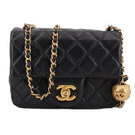 Black quilted mini CHANEL crossbody bag with gold chain and front CC logo