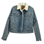 Blue denim jacket with sherpa fleece collar and button front, chest pockets