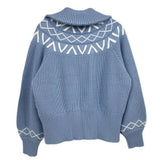 Blue knit pullover with ribbed turtleneck and geometric yoke pattern, back view