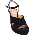 Black platform heeled sandal with ankle strap and crisscross upper