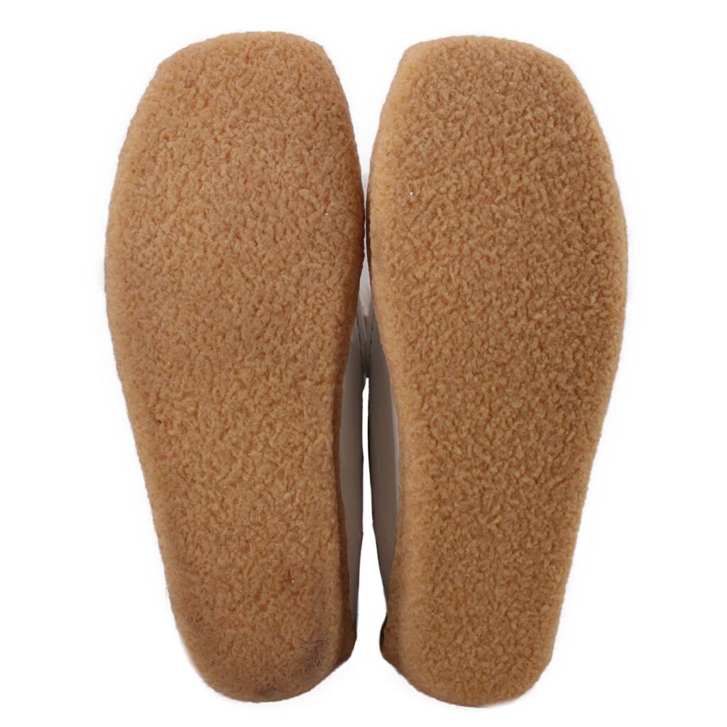Brown suede boot outsoles with rounded toe tread