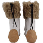 White moccasin boots with tan faux-fur cuffs and black lace pull tabs