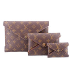 Monogram canvas Kirigami pouch set with multiple compartments and snap closures
