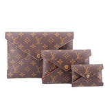 Monogram canvas Kirigami pouch set with multiple compartments and snap closures