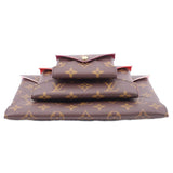 Monogram canvas Kirigami pouch set stacked with front flap and snap closure