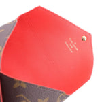 Red-orange leather inner panel on pouch with Louis Vuitton branding and gold stud