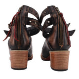 Black strappy heels from back with zip detail and wood block heel