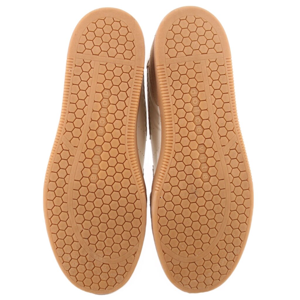 Mary Jane sneakers outsoles with hexagon traction pattern on tan rubber